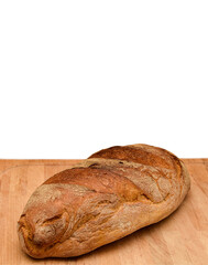 Bread on a Wooden Table isolated , space for text
