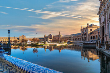 Sunset view of the Plaza de Espana or Spanish Square, a public park and gathering place in Seville, Spain. © Kirk Fisher