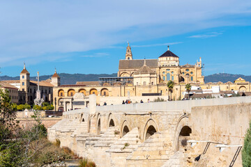 Fototapeta premium The Great Mosque of Córdoba or Mezquita seen from the Roman Bridge along the Guadalquivir River in Cordoba, Spain.
