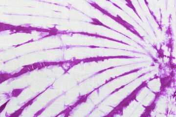Purple tie dye fabric texture background.
