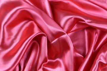 Obraz premium Red wrinkled cloth background for design in your work concept.