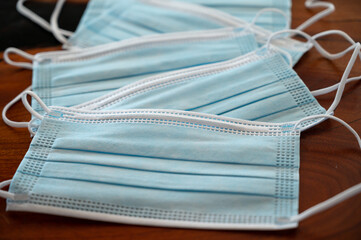 Closeup of several unused face masks.