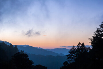 Sunrise in rural mountainous area of ​​Guatemala, a forest space source of oxygen and universal inspiration.