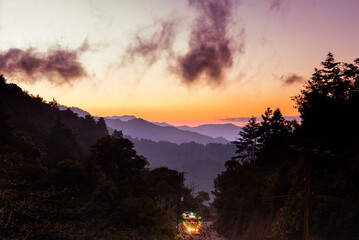 Panoramic view of sunrise in mountains rural area of Guatemala, in the distance you can see an...