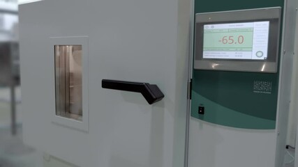 Heat and cold chamber (climatic chamber) for scientific and research experiments in a laboratory or in industrial production for testing equipment in various weather conditions. Shot in motion