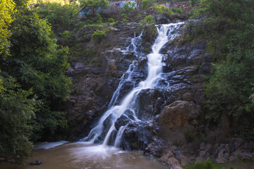 Obraz premium Waterfall with clear water in Los Filtros Viejos Park at Morelia, Michoacan, Mexico. Long exposure photography