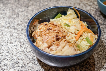 Chicken teriyaki donburi with rice. Japanese cuisine.