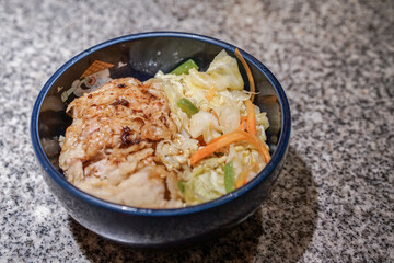 Chicken teriyaki donburi with rice. Japanese cuisine.