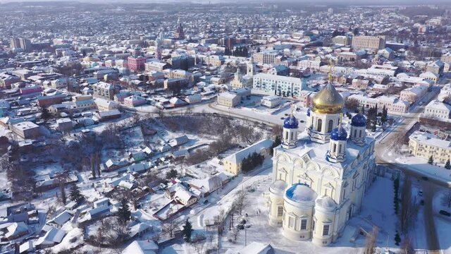Scenic aerial view of main Orthodox church in Russian city of Yelets, five domed Ascension Cathedral on sunny winter day