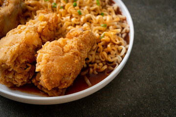 Korean instant noodles with fried chicken or Fried chicken ramyeon