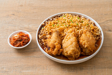 Korean instant noodles with fried chicken or Fried chicken ramyeon
