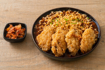 Korean instant noodles with fried chicken or Fried chicken ramyeon