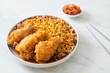 Korean instant noodles with fried chicken or Fried chicken ramyeon