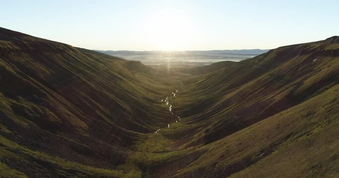 Flying above a river in the valley
