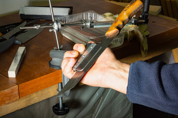 Sharpening knives using a special tool