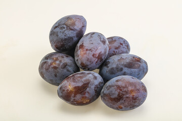 Purple sweet ripe plum heap