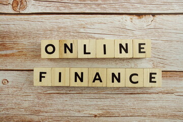 Online Finance word alphabet letters on wooden background