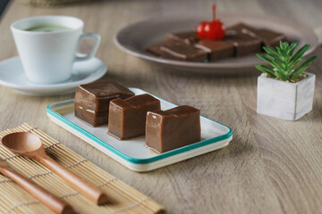 Yokan and matcha tea is japanese deserts served on wooden table
