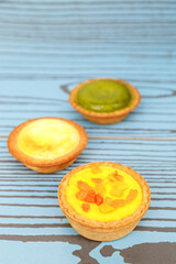 Fototapeta na wymiar Mango tart, Egg tart and Steamed custard tart