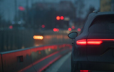 Cars staying in the morning traffic. Traffic jam on the streets of Bucharest, detail with the LED...
