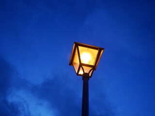 Fototapeta na wymiar Old street lamp in the evening