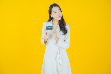 Portrait beautiful young asian woman smile with credit card - 479501906
