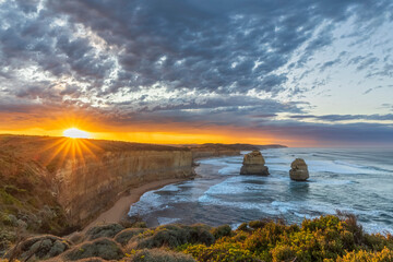 Australia, Victoria, View of Twelve Apostles and Gibson Steps in Port Campbell National Park at sunrise
