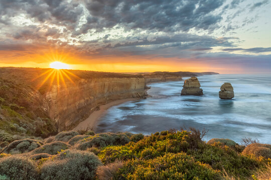 Australia, Victoria, View of Twelve Apostles and Gibson Steps in Port Campbell National Park at sunrise