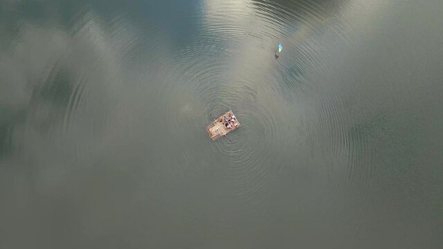aerial view of people on boat at carpathian mountains