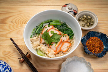 Egg Noodles and Wonton Noodles with Red Barbecue pork with hot soup.