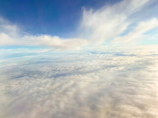 Naklejka premium background sky with clouds, top view from an airplane 