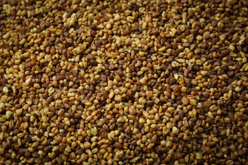 Buckwheat tea seeds all over background, close up