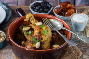 Chicken leg tagine with caramelised prunes and apricots and roasted almonds