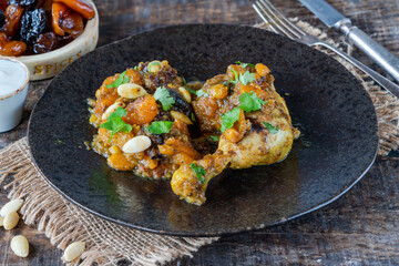 Chicken leg tagine with caramelised prunes and apricots and roasted almonds