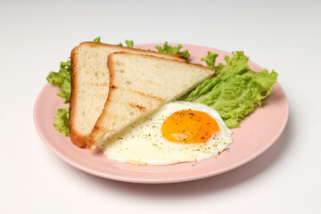 Fototapeta na wymiar Plate with tasty breakfast on white background