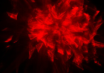 Abstract red lines drawn by light on a black background