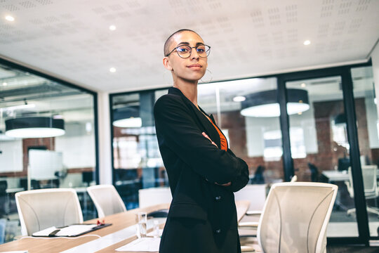 Confident female entrepreneur looking at the camera in an office