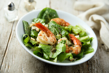 Homemade Caesar salad with shrimps