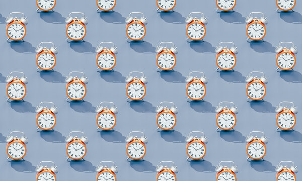 Repeating alarm clocks on blue background.