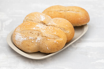 fresh bread in small dish on gray ceramic