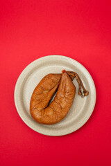 typical portuguese smoked sausage Farinheira on the dish