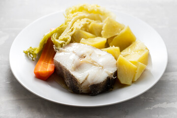 boiled fish with boiled potato, carrot and cabbage