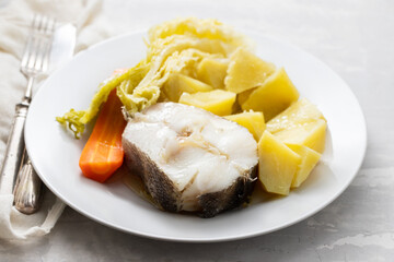 boiled fish with boiled potato, carrot and cabbage
