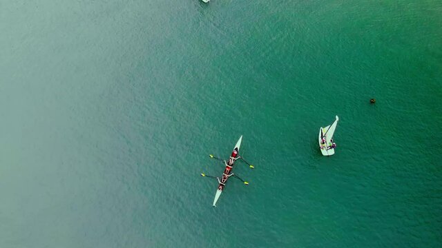 Birds Eye View of Rowing and Sailing Boats on the Turquoise Ocean