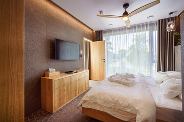 Interior of modern bedroom suite in luxury hotel
