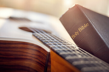 Holy Bible with guitar gospel music concept