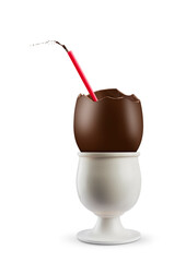 Broken chocolate easter egg on egg cup with drinking straw, on white background