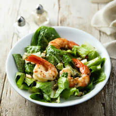 Homemade Caesar salad with shrimps