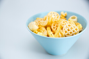 chips in a bowl. isolated on white