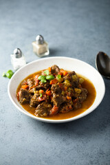 Beef ragout with vegetables and basil